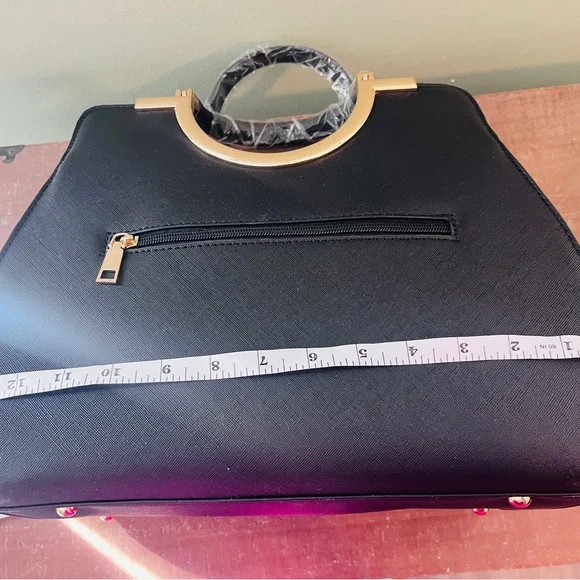 Elegant Black Handbag with Gold Accents - Picture 11 of 13
